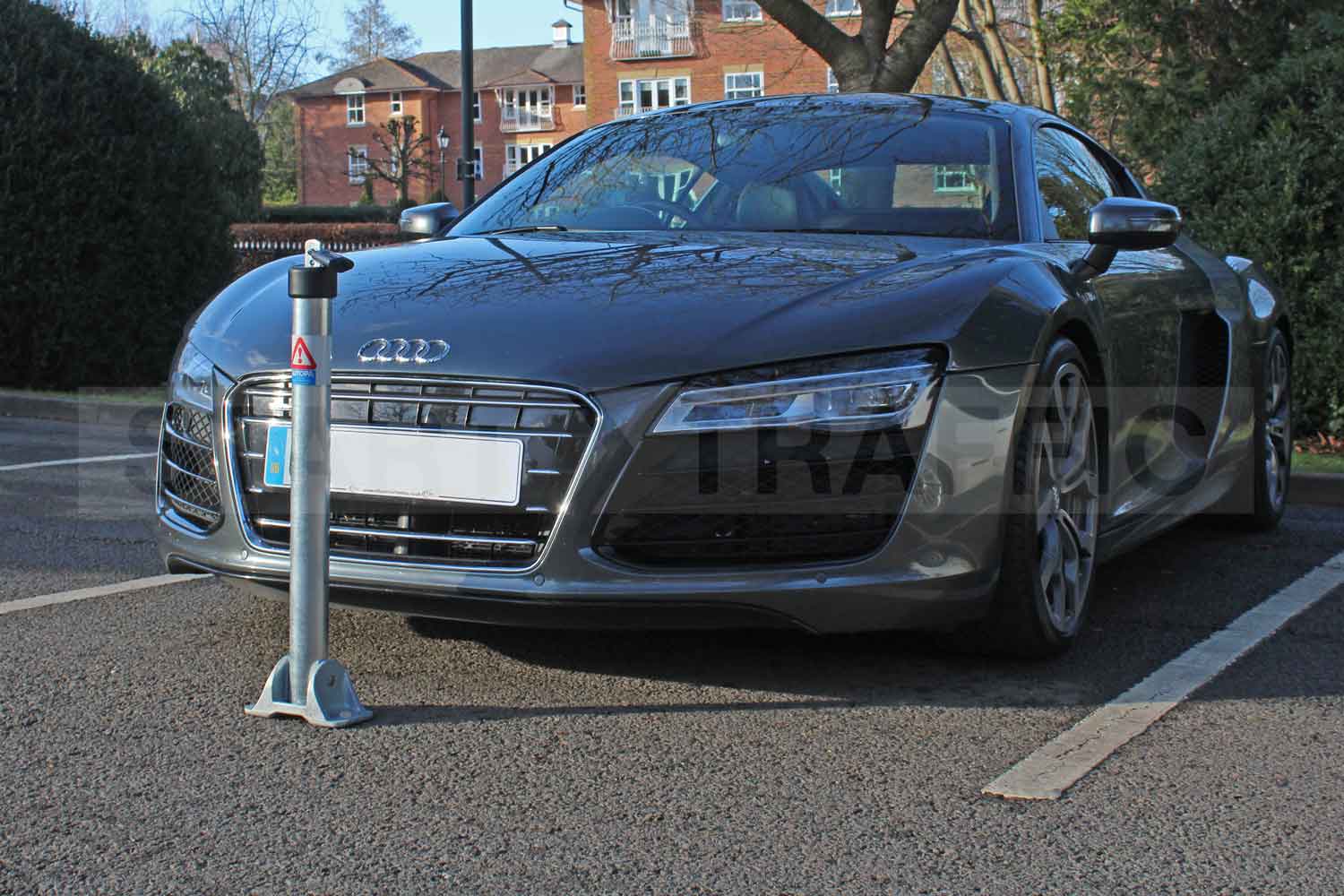 Hinged Padlock Parking post being used to reserve a space
