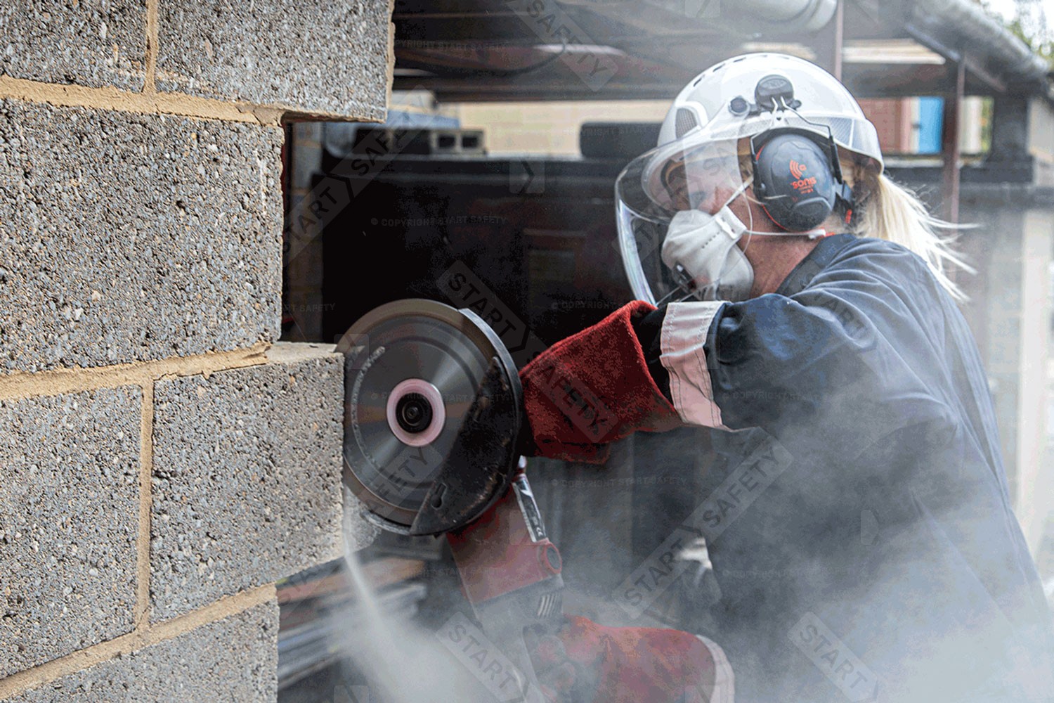 Worker Cutting While Wearing A Disposable FFP3 Dust Mask