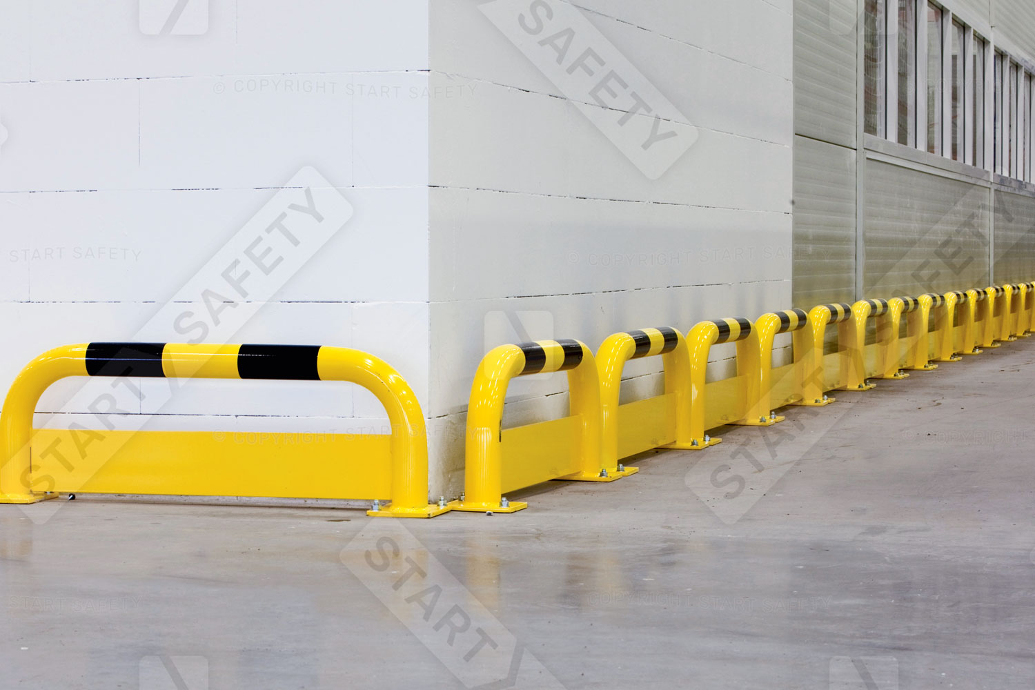 Black Bull Hoop Barriers With Under Run Protection Along Wall