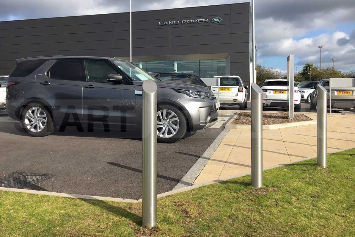 Stainless Bollards Installed at a car dealerships