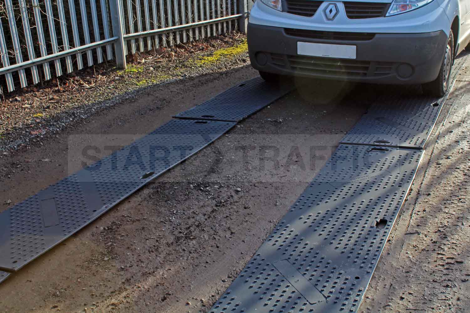 HalfTrak Euromat Ground Protection being driven on by Van